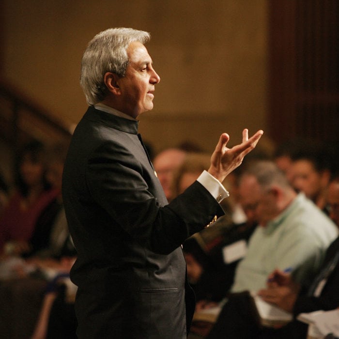 Pastor Benny Hinn teaching at conference