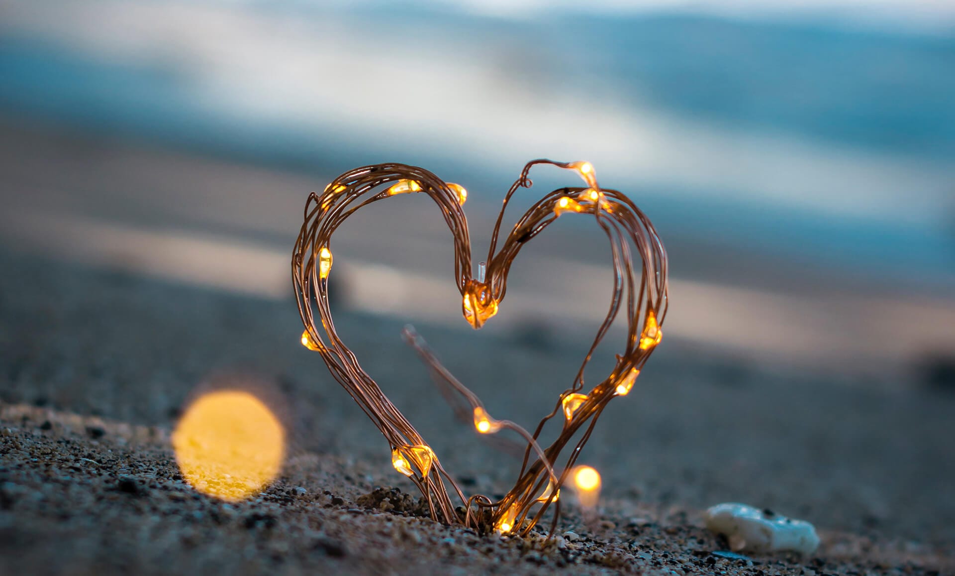 Lighted heart in sand-enewsletter-Benny Hinn Ministries