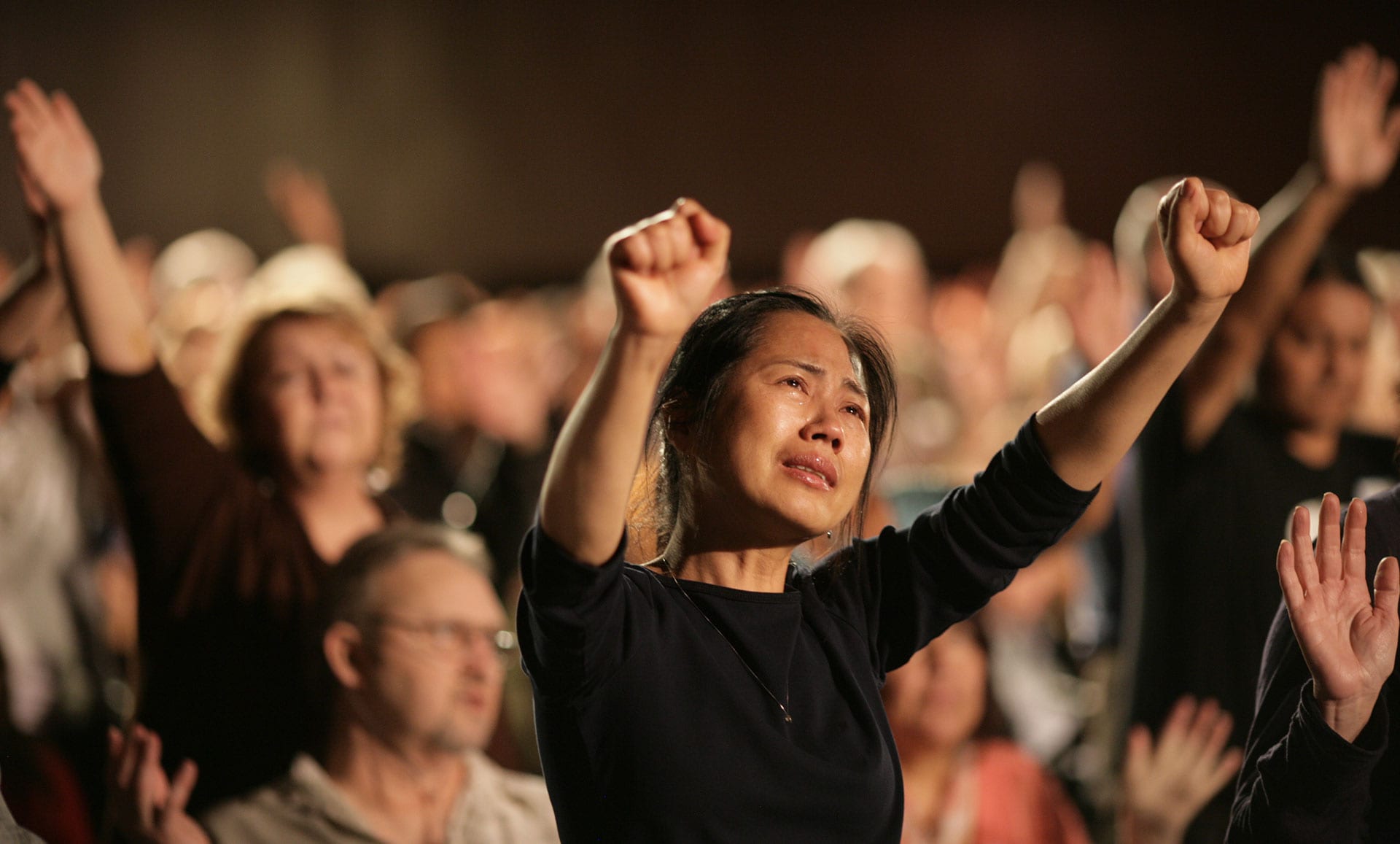 women crying at service