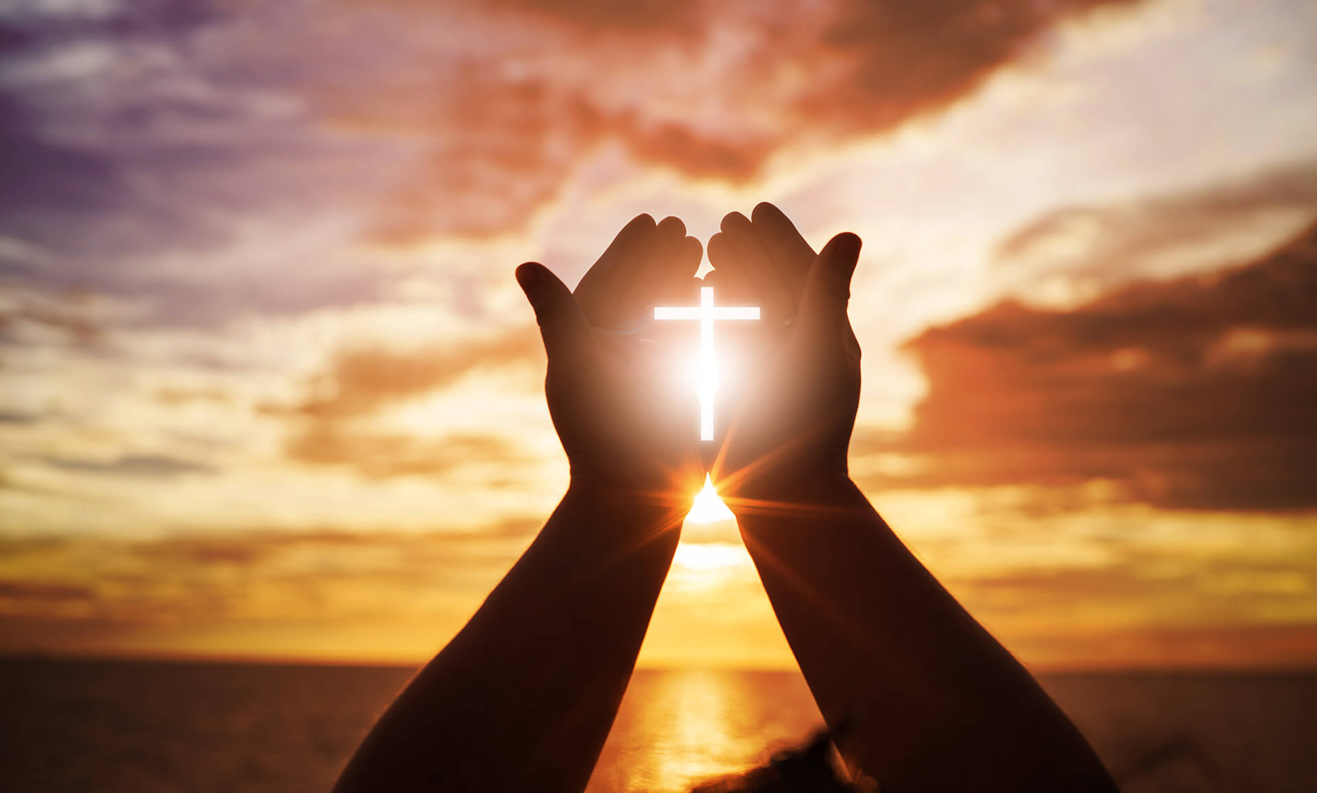 hands with sunset 