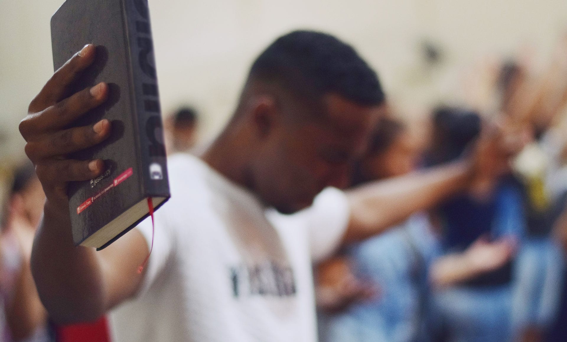 man holding bible