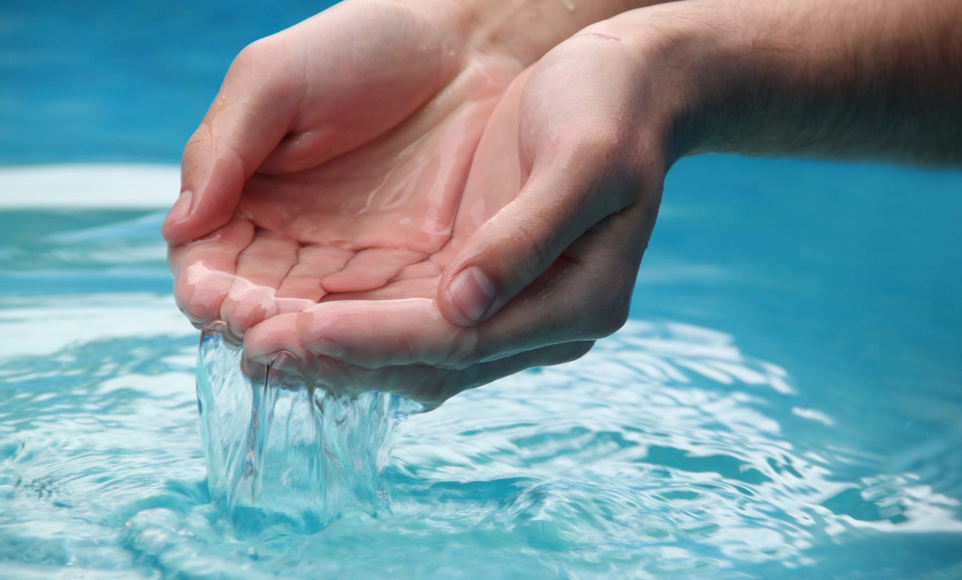 water pouring out of hands