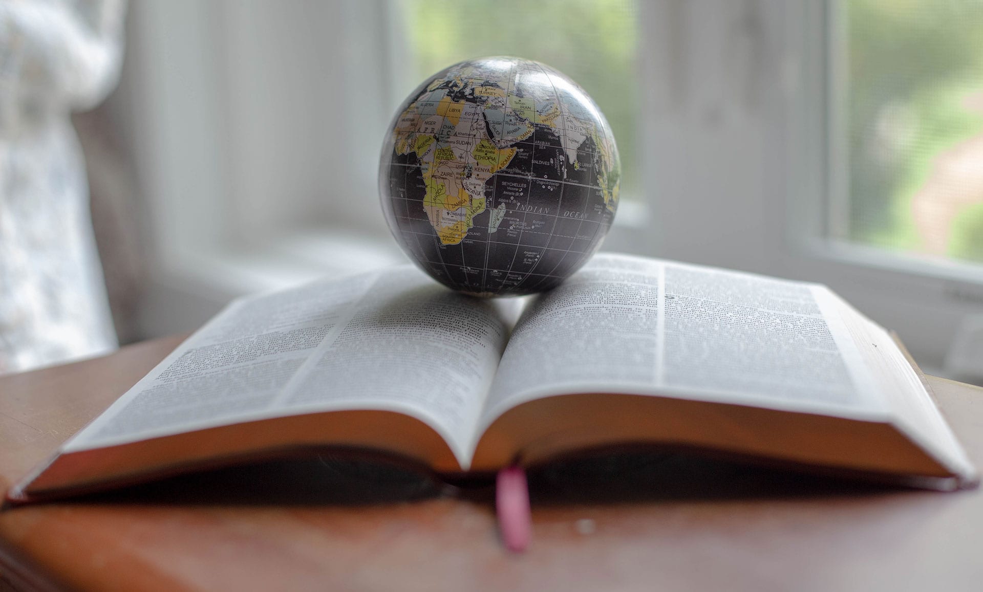 Globe on Bible