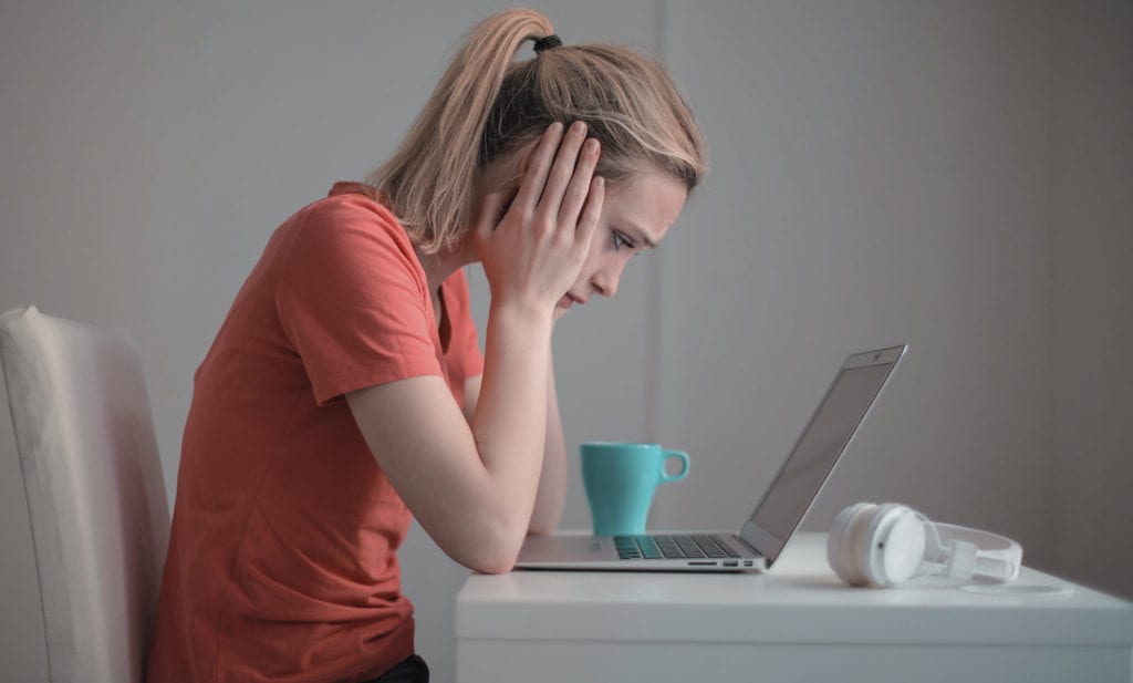 Sad Woman on Computer eblast Benny Hinn Ministries Sad Woman on Computer