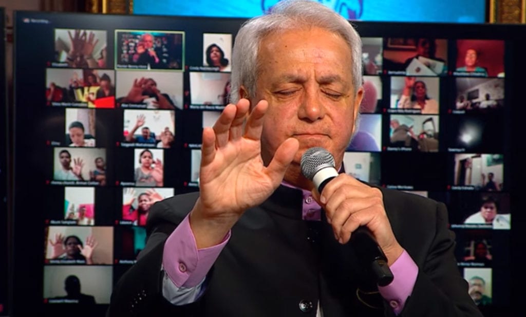 BHM Pastor Praying on Zoom