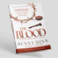 The Blood book by Benny Hinn on grey background